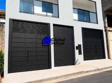 Fachada moderna com garagens e varandas envidraçadas · Casa à venda - Palmeiras (Parque Durval de Barros)