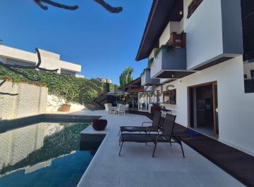 Foto · Casa reformado com varanda na região do Jardim Pernambuco II, Guarujá