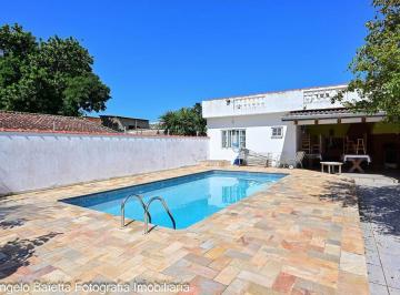 dynmqqg2ytyynje0zmmwnjm5_md · Casa com 3 dormitórios à venda, 227 m² - Centro - Peruíbe/SP