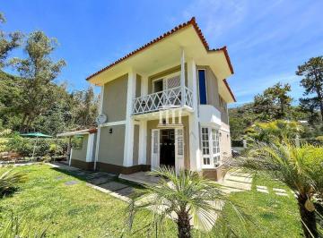031a01962ca227e3535d7a8b87e29ebe78a6c95b · Casa com 3 dormitórios à venda, 180 m² por R$ 770.000,00 - Golfe - Teresópolis/RJ