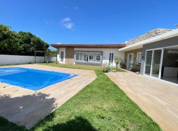2c250bd0-3ee8-4f07-b406-f71031ef40ce · Casa no condomínio Morada do Rio para venda com 6 quartos, sendo 6 suítes, 641m²