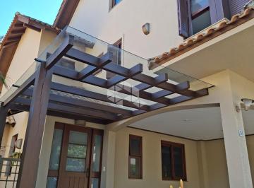Photo 1 · Casa em condomínio de 4 dormitórios, 3 vagas próximo ao Guaíba, Colégio Marista