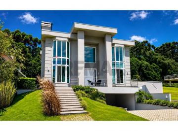 Casa · 550m² · 4 Quartos · 6 Vagas · Casa de Alto Padrão no Alphaville Graciosa – 550 m², Piscina Aquecida e Vista para a Mata