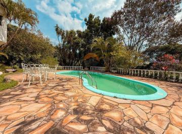 smjj2hs2ytk5nmrjzjfiy2ux_md · Casa de Alto Padrão com 4 Suítes, Piscina e Amplo Terreno na Represinha