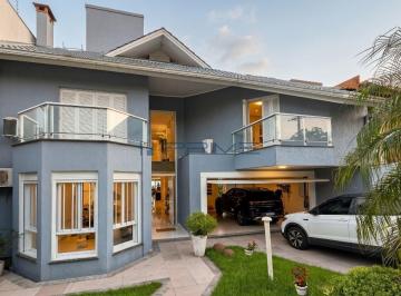 Casa · 550m² · 3 Quartos · 3 Vagas · Casa de Alto Padrão com 3 Suítes, Piscina e Vista para o Guaíba