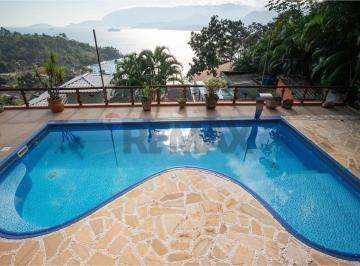 Casa · 447m² · 5 Quartos · 10 Vagas · Casa no Portinho: 4 Suítes, Piscina e Vista Mar