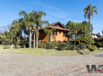 Casa · 385m² · 6 Quartos · 5 Vagas · Casa à venda no Terra Ville com 6 dormitórios e fundo para o lago.