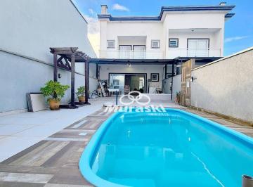 c221307ae4c7d113d3f3ae62489d8e0f03e39c97 · Sobrado com 3 dormitórios para alugar, 136 m² por R$ 1.500,00/dia - Brejatuba - Guaratuba/PR