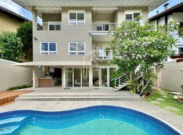 Casa · 450m² · 4 Quartos · 6 Vagas · Residência de Alto Padrão em Condomínio - 4 Suítes, Vista Moderna e Piscina!