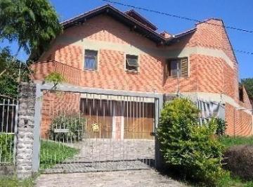 .jpg+2025-03-05 · Casa em Porto Alegre, no bairro Jardim Isabel, com 4 dormitório(s), à venda.