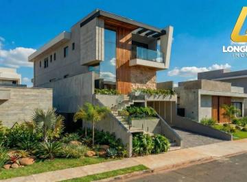 30cc3034452c90437916839cf44e7272d0bb6cc9 · Casa nova no Arujazinho IV com arquitetura contemporânea e fachada marcante