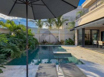 8cb7e87dceee160d23caced216de611d54a677e6 · Casa mobiliada com 3 suítes, 332 m² - venda por R$ 4.250.000 ou aluguel por R$ 27.401/mês - Alphavil