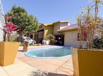 Casa · 228m² · 3 Quartos · 4 Vagas · Excelente casa a venda em Camobi com 3 quartos e 4 banheiros.