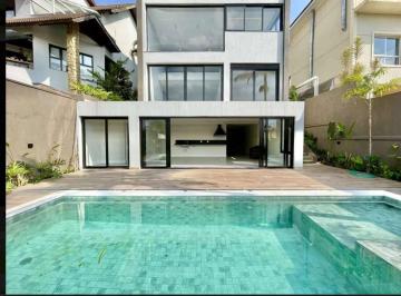Imagem · Casa 4 Suítes com Piscina, Espaço Gourmet e Vista para o Campo de Golfe para Locação – Condomínio Sã