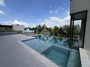Casa · 429m² · 4 Quartos · 4 Vagas · Casa alto padrão no Alphaville Dom Pedro com 4 suítes, piscina aquecida com sauna e armários