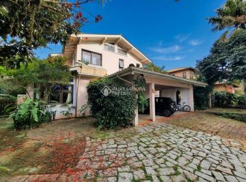 Casa · 250m² · 4 Quartos · 2 Vagas · Casa a venda em Condomínio fechado com saída ditera para praia no Rio Tavares, Sul da Ilha em Floria
