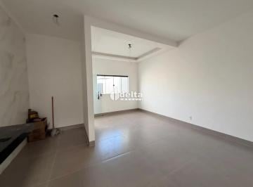 Casa · 125m² · 2 Quartos · 2 Vagas · Casa com 2 quartos sendo 1 suíte disponível para venda no bairro Martins em Uberlândia-MG