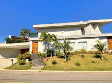 Fachada  · CASA MOBILIADA para VENDA ou LOCAÇÃO com 4 SUÍTES, PISCINA, ÁREA GOURMET. 428m² de ÁREA ÚTIL no COND