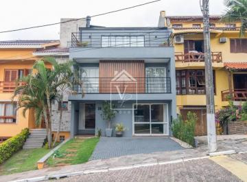 6c0d470a06759d6f474df70b225fcea431c72cd8 · Casa com 3 dormitórios para alugar, 330 m² por R$ 12.780/mês - Vila Nova - Porto Alegre/RS