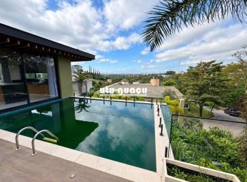 ae5aa03857cec7f424c4e925b2737b55008c7644 · Casa térrea, com 4 suítes no Condomínio Plaza Athenee