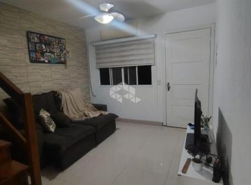 Photo 1 · Casa em condomínio com 2 dormitórios e 1 vaga de garagem, no bairro Humaitá, em