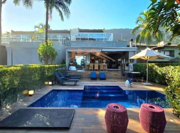 Imagem do Imóvel · Casa pé na areai à venda na praia de Juquehy com 4 suítes, espaço gourmet e piscina privativa