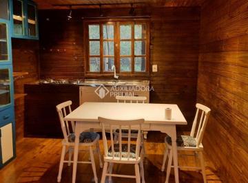 Sala de jantar x cozinha · Casa Aconchegante com Vista Panorâmica e Espaço Gourmet | Santa Catarina 5 min da Praia da ferrugem