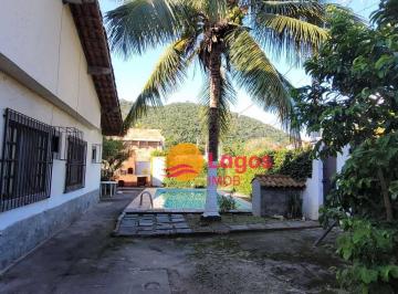 Lateral da casa · Casa à venda, 240 m² por R$ 680.000,00 - Praia de Itaipuaçu (Itaipuaçu) - Maricá/RJ