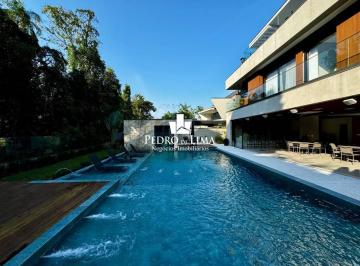 365755a88699e7d300fd663e225f12e3bc207ef3 · Casa com 9 dormitórios à venda, 976 m² por R$ 23.000.000,00 - Riviera Módulo 12 - Bertioga/SP