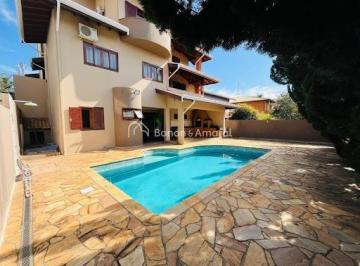 Casa · 372m² · 3 Quartos · 4 Vagas · Elegante Sobrado com Área Gourmet e 3 Suítes no Condomínio Terras do Caribe em V