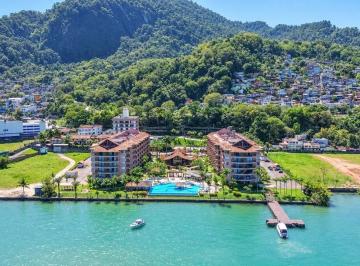 Apartamento · 40m² · 1 Quarto · 1 Vaga · Elegância à beira-mar em um endereço icônico de Angra
