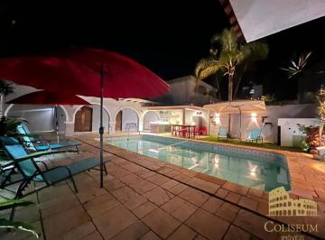 c90d5f61eaedaf5c78d49edd527197b2431828f5 · Casa com 4 dormitórios à venda, 200 m² por R$ 990.000,00 - Balneário Flórida - Praia Grande/SP