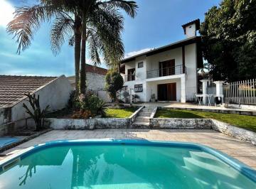 Photo 1 · Casa à venda com 250m², 4 quartos, 1 suíte, 2 vagas no bairro Encosta do Sol em