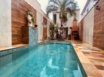 tvpbfiq2ywe0nmu4mjuymtq0_md · Casa à venda com piscina em Santos