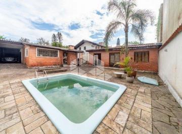 Casa · 250m² · 3 Quartos · 4 Vagas · Casa térrea com 3 dormitórios no bairro Tristeza