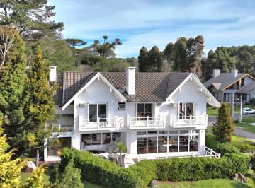 Casa · 500m² · 7 Quartos · 6 Vagas · Casa de três andares no Condomínio Gramado Golf Club