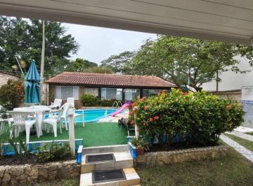 3aafecd5860f95c69fd2a3bf4e81d4f6a66331b2 · Casa com 4 dormitórios para alugar, 313 m² por R$ 4.735,27/dia - Riviera de São Lourenço - Bertioga/