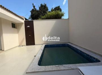 Casa · 309m² · 3 Quartos · 3 Vagas · Casa com 3 quartos sendo suíte disponível para venda no bairro Jardim Karaíba em Uberlândia-MG