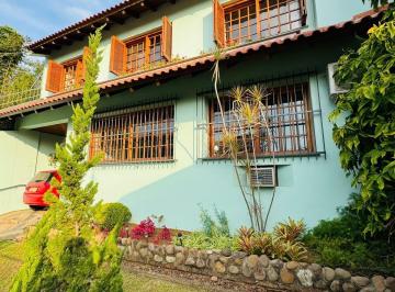 Photo 1 · Casa com 5 quartos e 250m² à venda em Chácara das Pedras, Porto Alegre