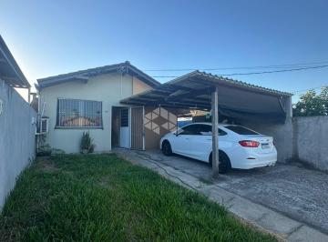 Photo 1 · Casa á venda com três quartos e amplo pátio no Bairro Pinheiro Machado em Santa