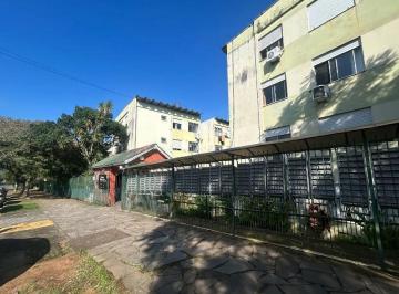 Photo 1 · Apartamento com 3 dormitórios no bairro Vila Nova em Porto Alegre/RS