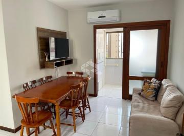 Photo 1 · Apartamento 2 dormitórios, banho social, sacada com churrasqueira, com box, no C