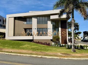 Casa · 390m² · 4 Quartos · 4 Vagas · Casa de Luxo no Alphaville Vespasiano — 391m², 4 Quartos, 3 Suítes, Piscina e Energia Solar.