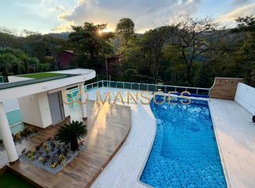 Casa · 474m² · 4 Quartos · 6 Vagas · Casa à Venda no Vila Del Rey, Nova Lima — 474m², 4 Suítes, Piscina, Elevador e 6 Vagas de Garagem.