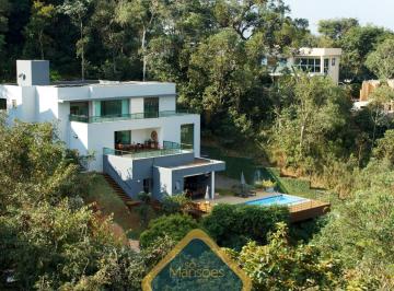 Casa · 480m² · 4 Quartos · 4 Vagas · Casa de Luxo de 480 m² à Venda com 3 Suítes e Vista para a Lagoa no Condomínio Quintas do Sol, Nova 
