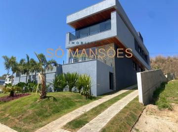 Casa · 376m² · 4 Quartos · 2 Vagas · Casa Espaçosa de 376 m² à Venda com 4 Suítes e Piscina com Borda Infinita no Condomínio Alphaville,