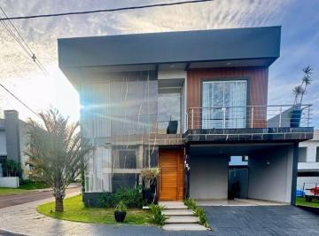 1d2895b36f282897ee1f67a80f7f14e07303a466 · Sobrado Residencial à venda, FAG, Cascavel - SO1334.