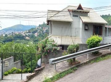 Casa · 345m² · 4 Quartos · 4 Vagas · Casa à venda em Porto Alegre-RS, bairro Nonoai: 4 quartos, 2 suítes, 3 salas, 3 banheiros, 4 vagas d