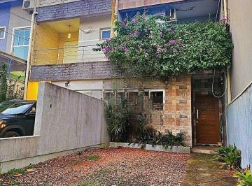 Photo 1 · Casa em condomínio de 2 quartos, 2 suítes e 2 vagas no bairro Alto Petrópolis.