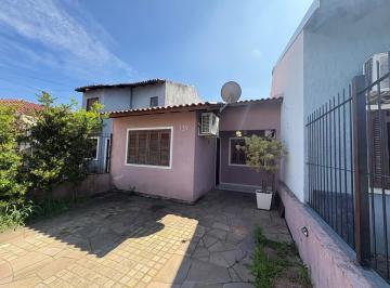 Photo 1 · Casa térrea com 3 dormitórios, salão de festas com churrasqueira e 2 vagas de ga